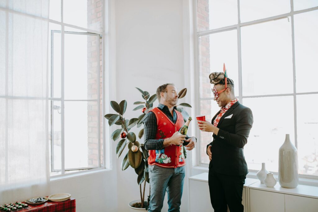 10 Reasons to Hire an Event Planner in Singapore, Colleagues celebrating at a work event.